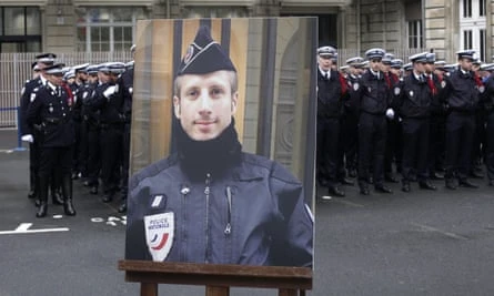 Macron and Le Pen pay tribute to officer killed in Champs Élysées attack | 105808