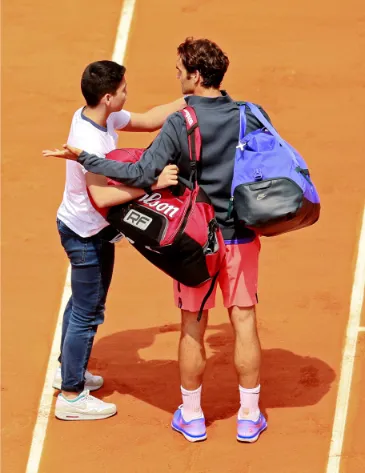 French Open security breach as fan attempts Federer selfie