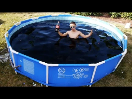 Taking a Bath in a Giant 1,500 Gallon Coca-Cola Swimming Pool! | 98759